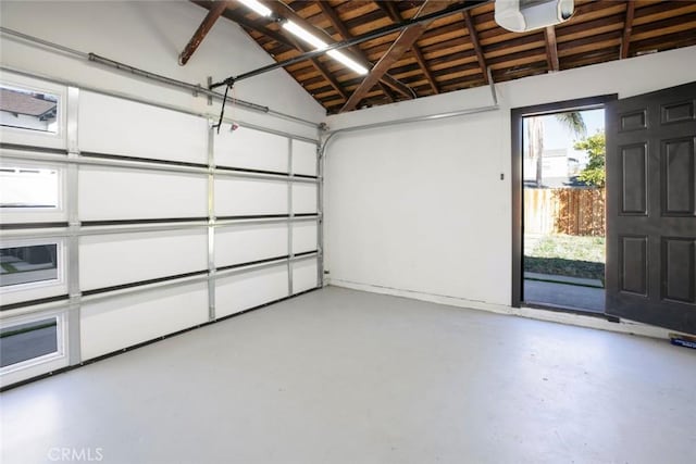 garage featuring a garage door opener