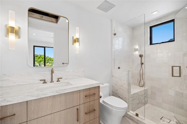 20 Balboa Cvs, Newport Beach, CA 92663 - bathroom featuring toilet, a stall shower, a healthy amount of sunlight, and vanity