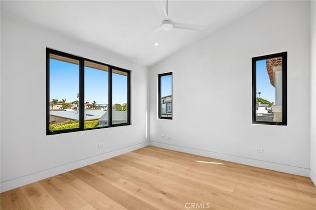 20 Balboa Cvs, Newport Beach, CA 92663 - spare room with light wood-style flooring, vaulted ceiling, and plenty of natural light