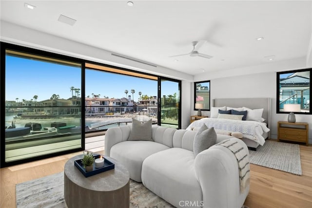 20 Balboa Cvs, Newport Beach, CA 92663 - bedroom with a ceiling fan and wood finished floors