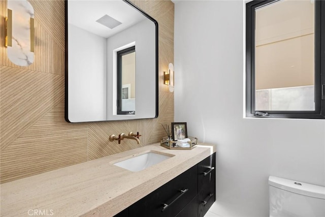 20 Balboa Cvs, Newport Beach, CA 92663 - half bathroom featuring tasteful backsplash, toilet, and vanity