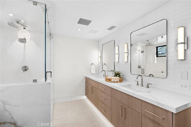 20 Balboa Cvs, Newport Beach, CA 92663 - full bathroom featuring a shower stall, double vanity, backsplash, and tile patterned flooring