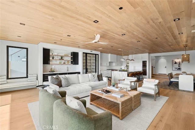 20 Balboa Cvs, Newport Beach, CA 92663 - living area with bar area, light wood finished floors, and wooden ceiling