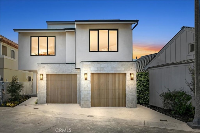20 Balboa Cvs, Newport Beach, CA 92663 - contemporary house with stone siding, driveway, a garage, and stucco siding