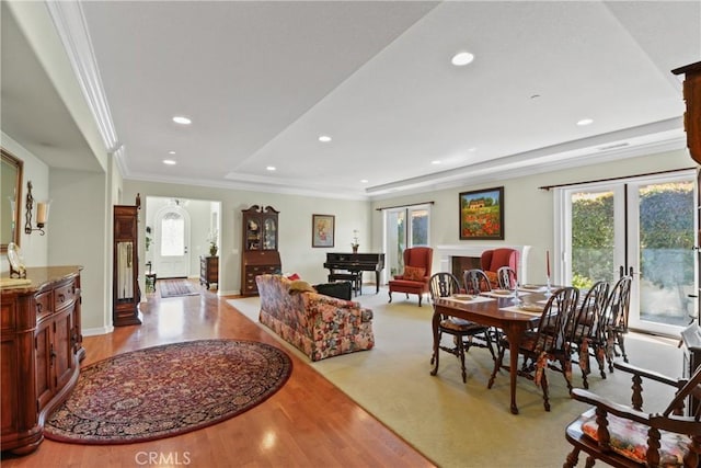 dining room featuring french doors, plenty of natural light, and crown molding