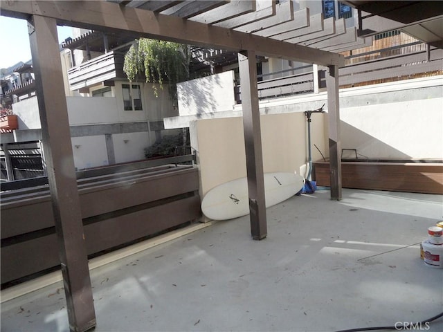 view of patio featuring a pergola