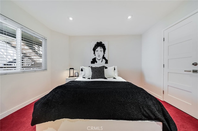 bedroom with recessed lighting, baseboards, and carpet