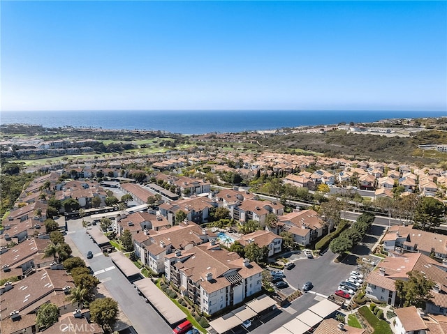 bird's eye view with a residential view and a water view