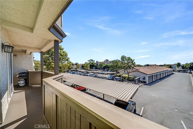 balcony with grilling area and a residential view