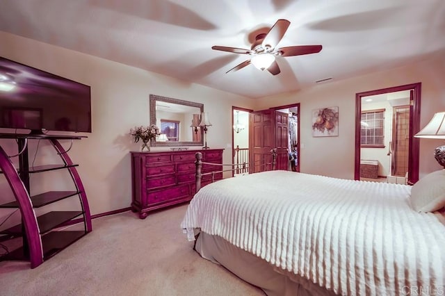 carpeted bedroom featuring visible vents, baseboards, and ceiling fan