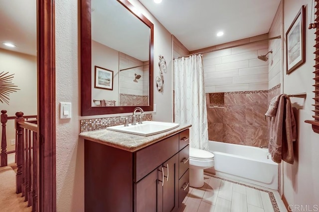 bathroom featuring recessed lighting, toilet, vanity, and shower / tub combo with curtain