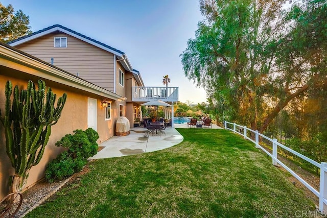 view of yard featuring a fenced in pool, a patio, and a fenced backyard