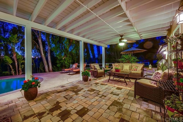 view of patio with outdoor lounge area, a ceiling fan, and an outdoor pool