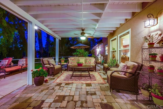 view of patio / terrace with a ceiling fan and outdoor lounge area