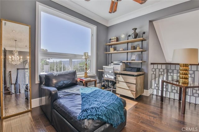 living area featuring baseboards, an upstairs landing, wood finished floors, and ornamental molding