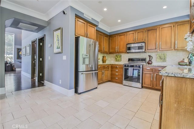 kitchen with brown cabinetry, decorative backsplash, and stainless steel appliances