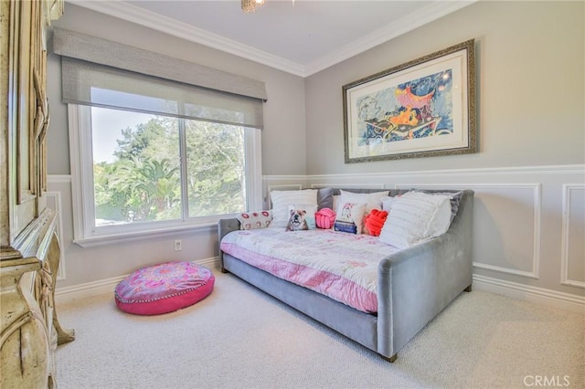 bedroom featuring baseboards, carpet floors, and crown molding