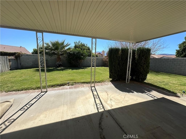 view of patio featuring a fenced backyard