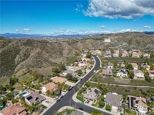 bird's eye view featuring a residential view and a mountain view