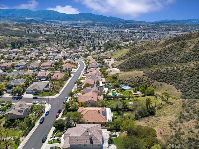 birds eye view of property featuring a residential view and a mountain view