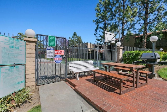 exterior space with a gate and fence