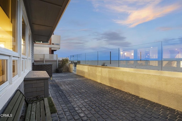 view of patio with a balcony