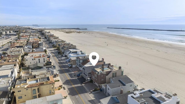 aerial view with a view of the beach and a water view