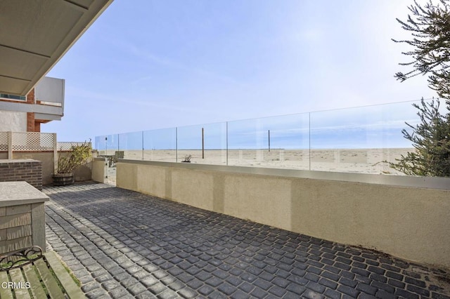 view of patio / terrace with a balcony