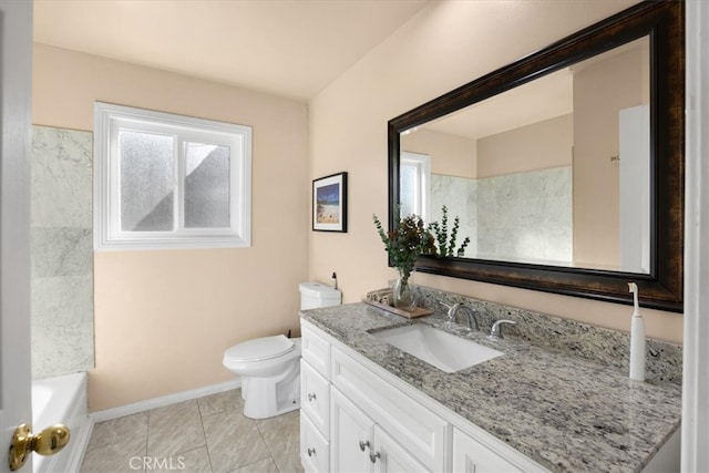 full bath featuring vanity, toilet, plenty of natural light, and baseboards