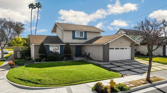 traditional home with a front yard, an attached garage, brick siding, and driveway