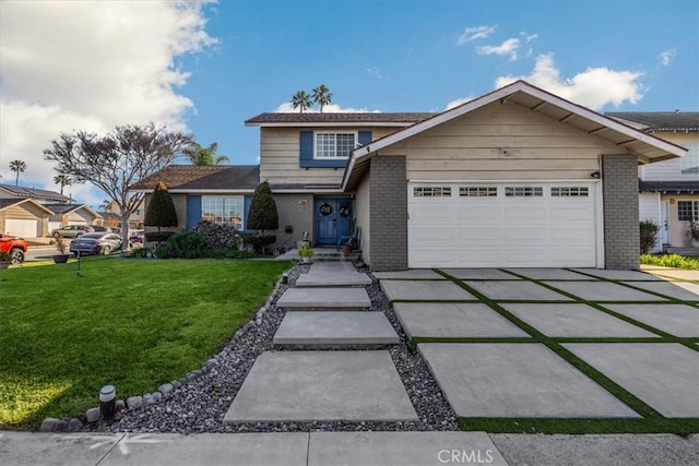 traditional-style home featuring a garage, brick siding, concrete driveway, and a front yard