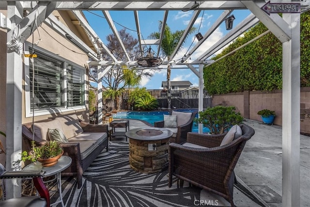 view of patio / terrace with an outdoor living space, a fenced backyard, and a fenced in pool