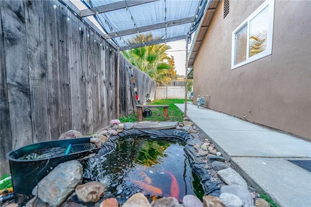 view of yard with a patio and a fenced backyard