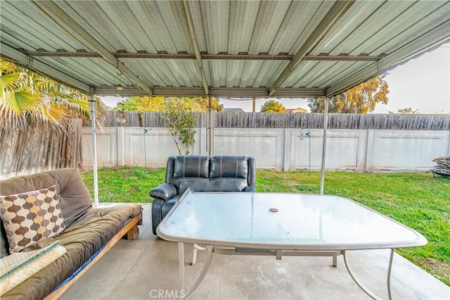 view of patio featuring outdoor lounge area and a fenced backyard