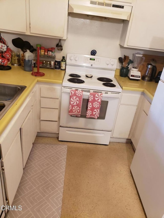 kitchen with white range with electric cooktop, under cabinet range hood, a sink, white cabinetry, and light countertops