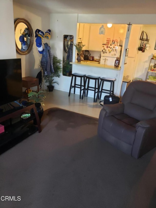 living room with finished concrete flooring