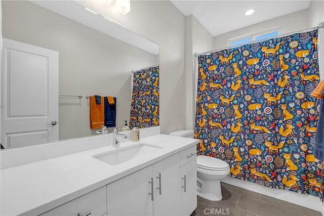 full bathroom with tile patterned floors, a shower with shower curtain, toilet, and vanity