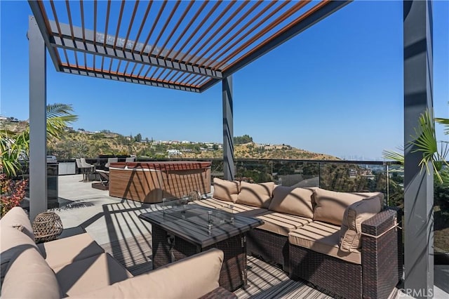 view of patio / terrace featuring an outdoor living space and a pergola