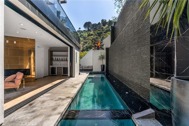 view of swimming pool featuring a fenced in pool and fence private yard