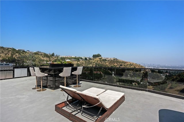 view of patio featuring outdoor dining space and area for grilling