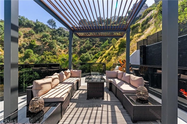 view of patio / terrace featuring an outdoor living space and a pergola