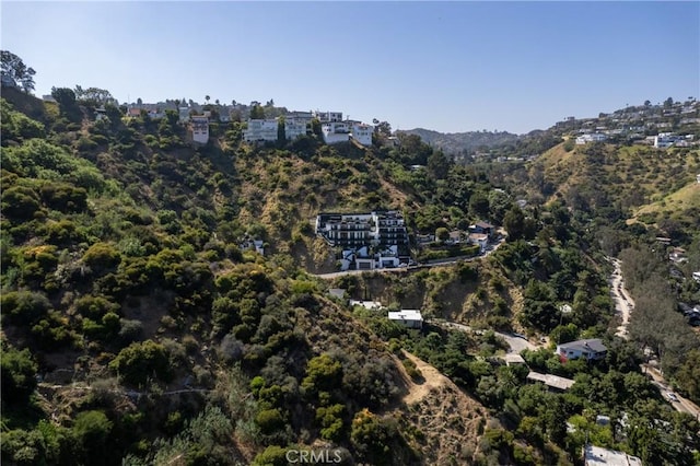 drone / aerial view with a view of trees