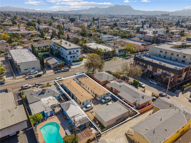 bird's eye view with a mountain view