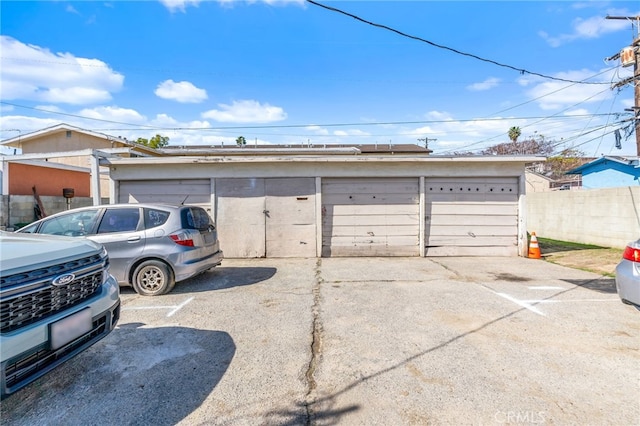 garage with fence