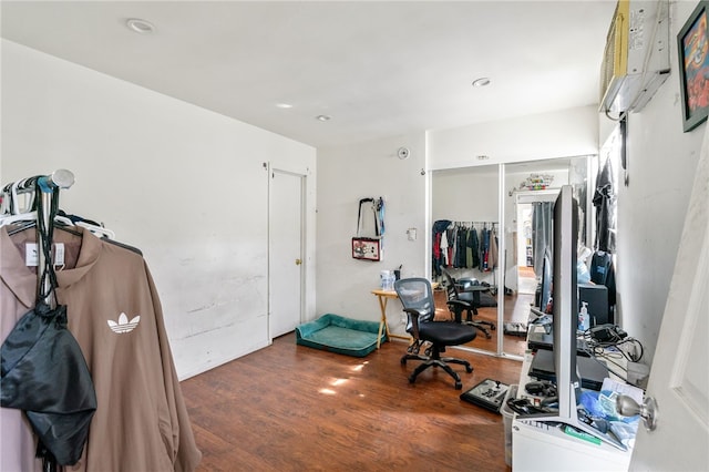 exercise area with wood finished floors