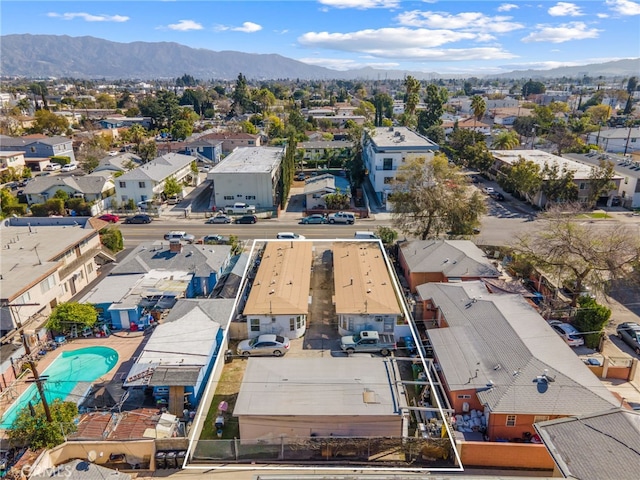 drone / aerial view with a mountain view and a residential view