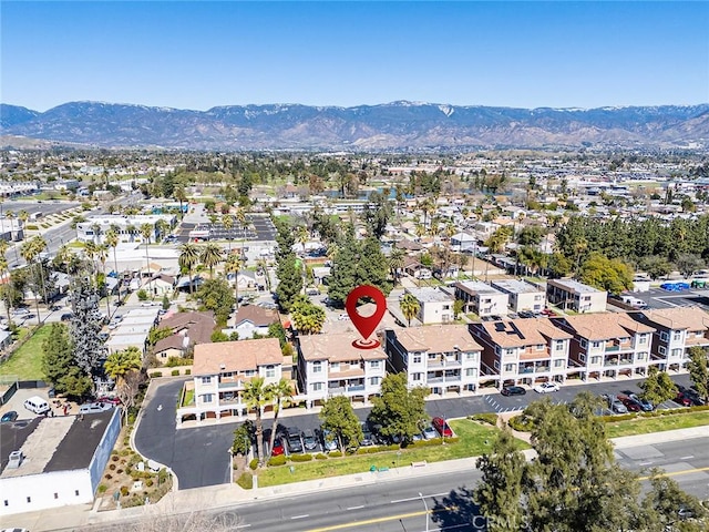 aerial view featuring a mountain view and a residential view