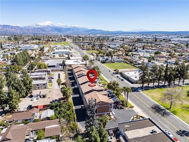 birds eye view of property with a residential view and a mountain view