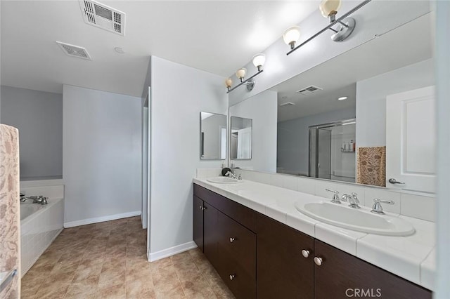 full bathroom featuring a sink, visible vents, and a shower stall