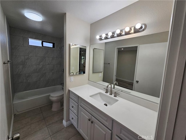 full bathroom featuring tile patterned floors, shower / bathtub combination, toilet, and vanity